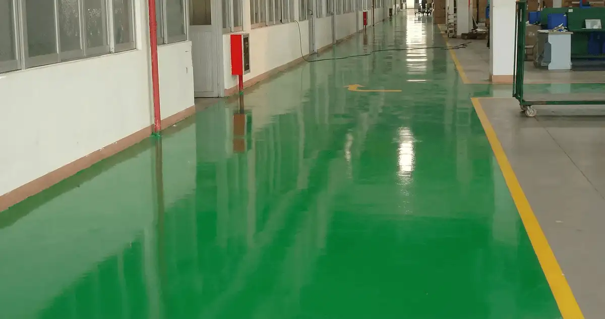 A factory floor professionally covered and marked with epoxy flooring in Tampa, FL