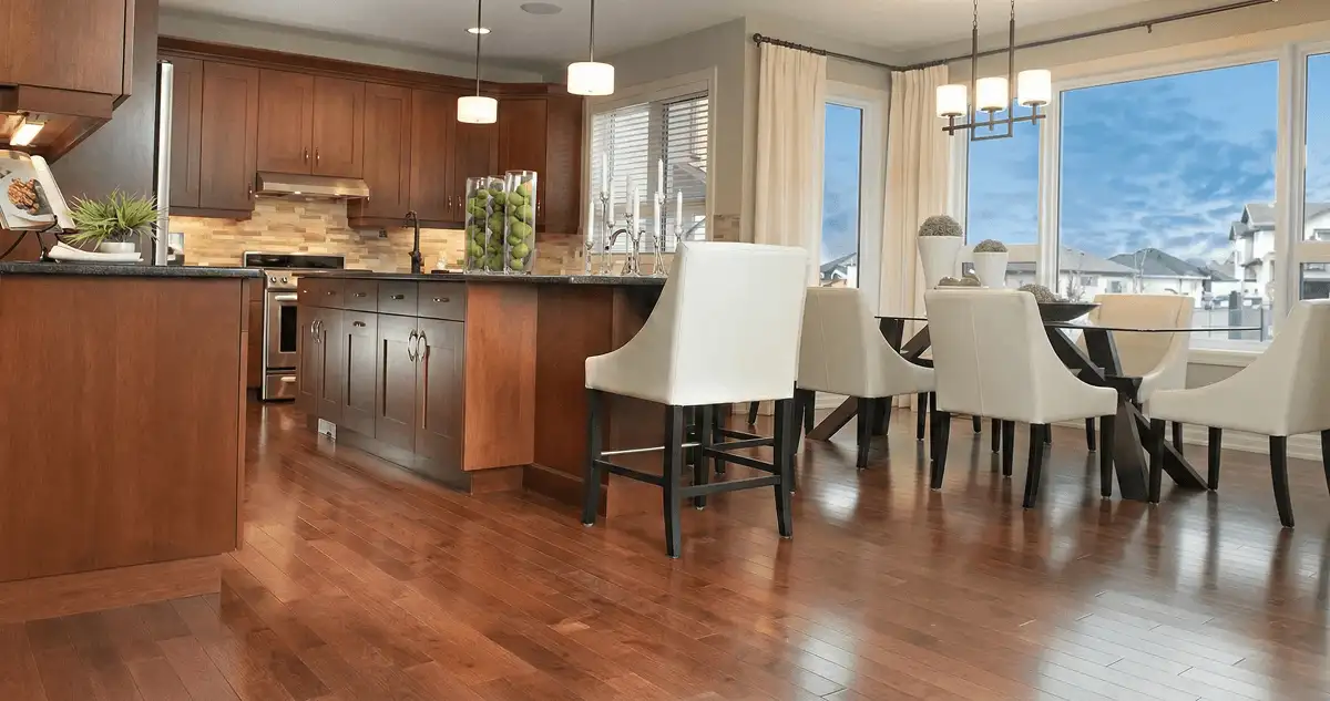 A modern kitchen with professionally installed wood flooring in Tampa, FL