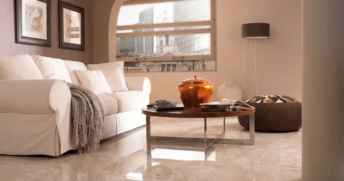 Modern living room with professionally installed marble flooring, a beige sofa, coffee table in Tampa, FL