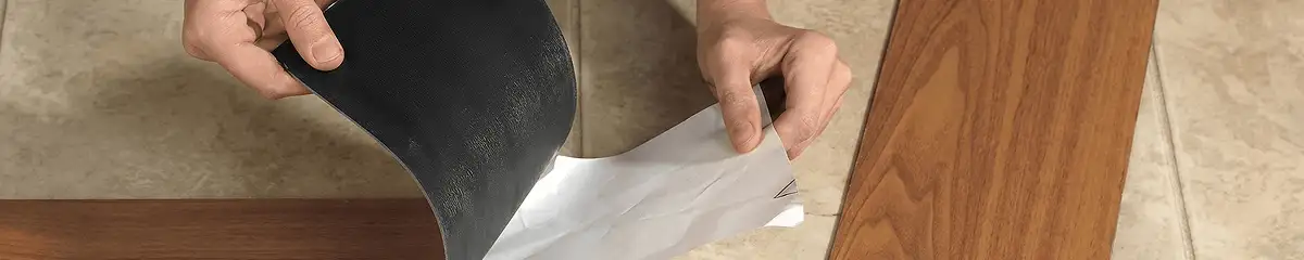 A professional installing vinyl flooring in Tampa, FL